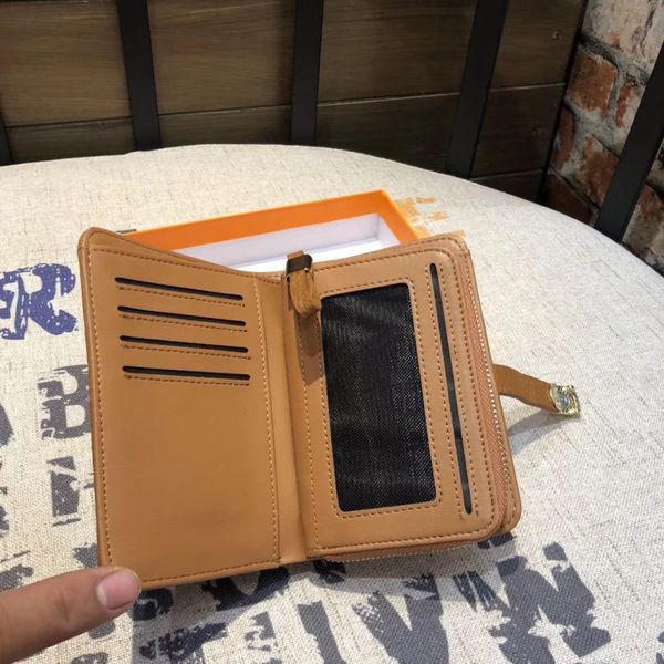 handbag women's middle and long buckle litchi leather zipper wallet multi card wallet, Red;black
handbag women's middle and long buckle litchi leather zipper wallet multi card wallet, Red;black