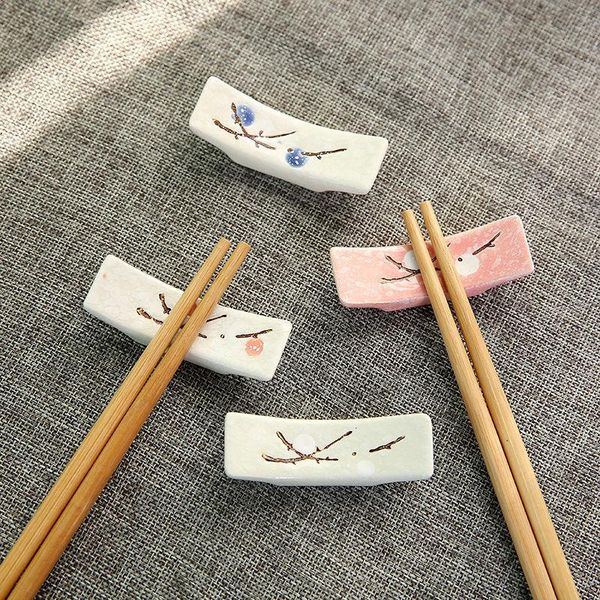 chopsticks 1pc creative japanese plum blossom holder stick pillow ceramic sushi kitchen supplies household
chopsticks 1pc creative japanese plum blossom holder stick pillow ceramic sushi kitchen supplies household