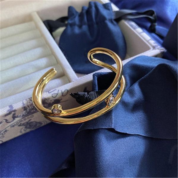 bangle simple fashion pear-shaped stone gold color for women open, Black 
bangle simple fashion pear-shaped stone gold color for women open, Black