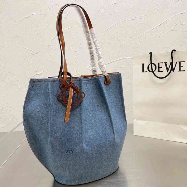 net red same fashion canvas denim pleated tote bag one shoulder hand large capacity women 2021 new zly bags
net red same fashion canvas denim pleated tote bag one shoulder hand large capacity women 2021 new zly bags