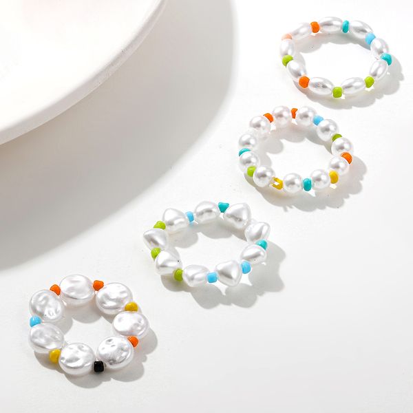 trendy irregular imitation pearls beaded rings for women bohemia mixing colorful seed bead finger ring elastic jewelry, Silver
trendy irregular imitation pearls beaded rings for women bohemia mixing colorful seed bead finger ring elastic jewelry, Silver