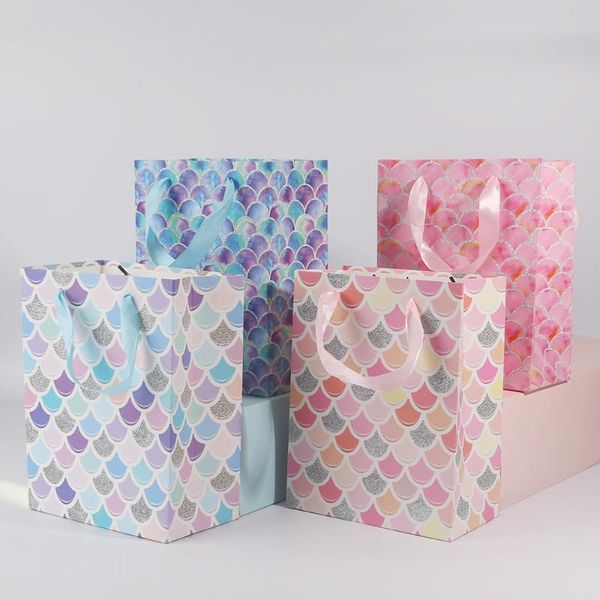 gift wrap 12pcs bag with handles paper dreamy fish pattern clothing shopping packaging
gift wrap 12pcs bag with handles paper dreamy fish pattern clothing shopping packaging