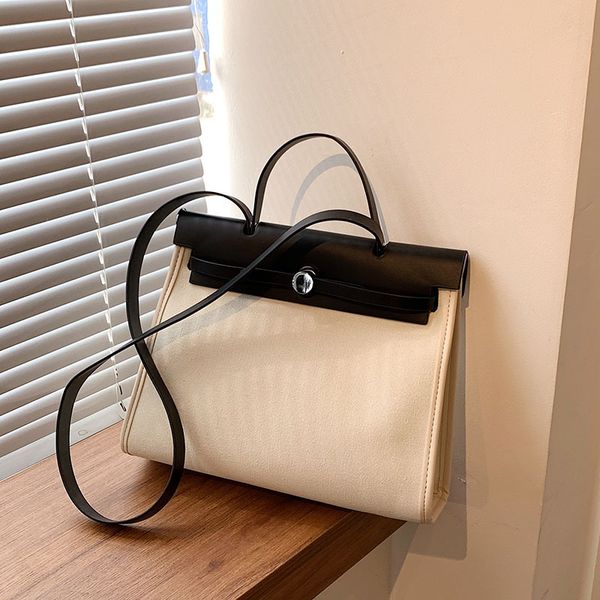 factory direct sale 75% off popular large capacity women's 2021 autumn new messenger canvas texture portable tote bags
factory direct sale 75% off popular large capacity women's 2021 autumn new messenger canvas texture portable tote bags