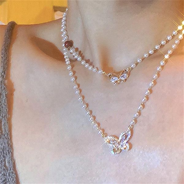 pendant necklaces vintage imitation pearl crystal butterfly necklace for women temperament clavicle chain fashion jewelry choker, Silver
pendant necklaces vintage imitation pearl crystal butterfly necklace for women temperament clavicle chain fashion jewelry choker, Silver