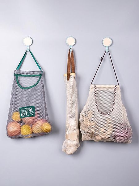 storage bags kitchen multi-functional wall hanging fruit and vegetable bag portable hollow mesh breathable
storage bags kitchen multi-functional wall hanging fruit and vegetable bag portable hollow mesh breathable