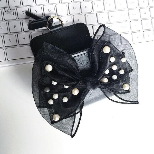 car organizer pearl bow outlet storage box multi-function mobile phone pocket /
car organizer pearl bow outlet storage box multi-function mobile phone pocket /