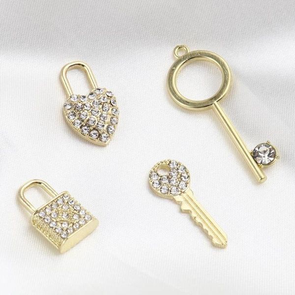 charms 2pcs creative lock key with rhinestone pearl imitation love shape pendant jewelry for diy making bracelet necklace, Bronze;silver
charms 2pcs creative lock key with rhinestone pearl imitation love shape pendant jewelry for diy making bracelet necklace, Bronze;silver