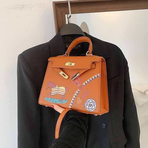 luxury design handbag new fashion girl's graffiti spray painting one shoulder cross carry small square bag in summer 2021
luxury design handbag new fashion girl's graffiti spray painting one shoulder cross carry small square bag in summer 2021