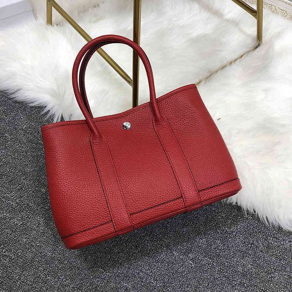 design s high women's leather large capacity bucket fashion tote handbag
design s high women's leather large capacity bucket fashion tote handbag