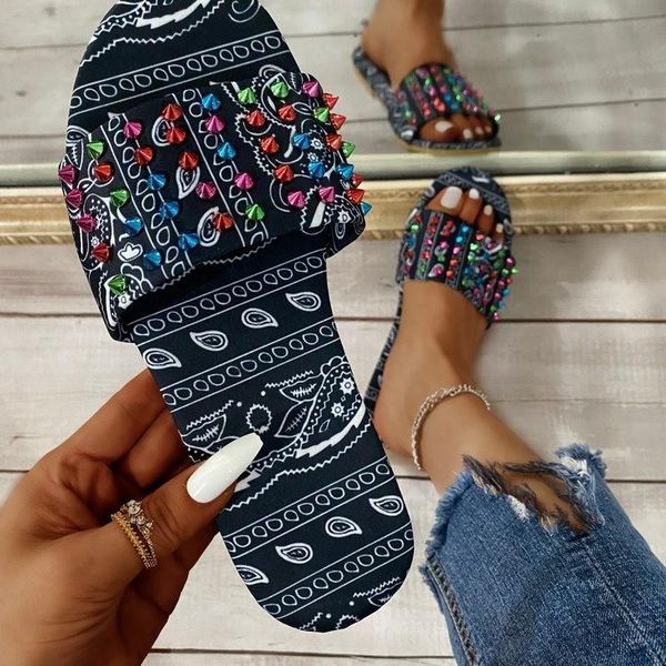 summer european and american large one-piece sandals flat bottom round head rivet women's shoes slippers, Black
summer european and american large one-piece sandals flat bottom round head rivet women's shoes slippers, Black