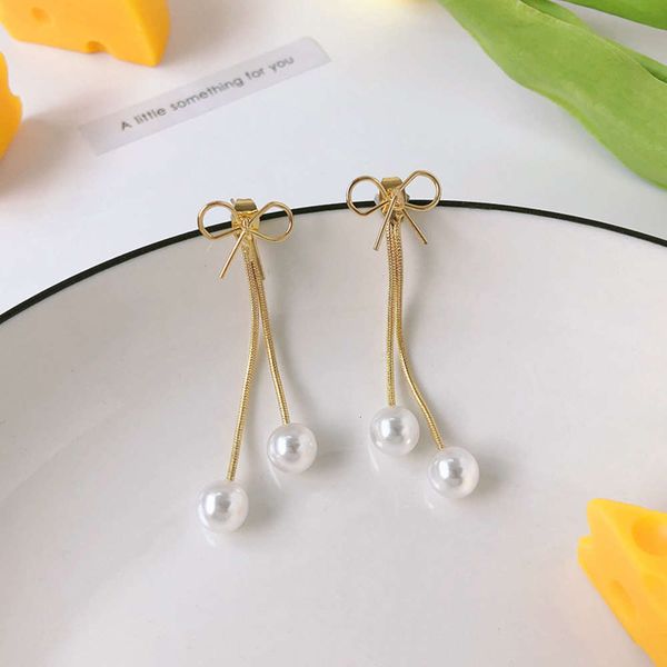 korean net red long tassel ear line femininity simple small fresh bow show face thin pearl earrings, Black
korean net red long tassel ear line femininity simple small fresh bow show face thin pearl earrings, Black