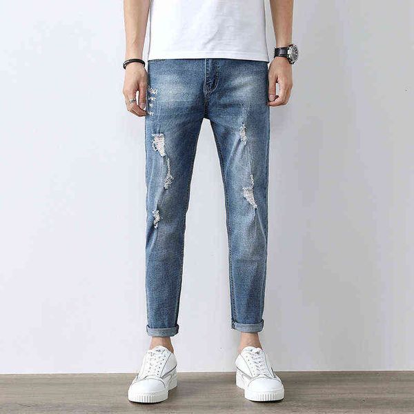 spring and summer 2021 perforated denim pants light blue small foot nine point men's jeans trend
spring and summer 2021 perforated denim pants light blue small foot nine point men's jeans trend