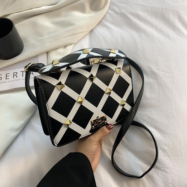 evening bags bag 2021 fashion big rivet color matching messenger shoulder female handbag underarm
evening bags bag 2021 fashion big rivet color matching messenger shoulder female handbag underarm