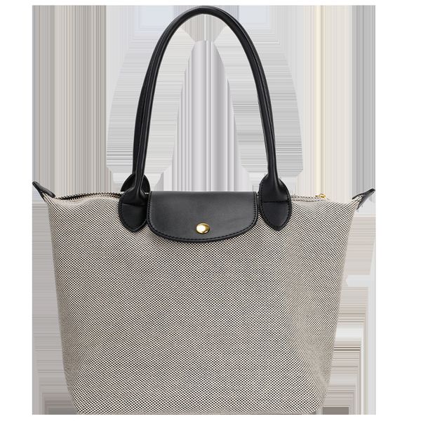 longxiang autumn new canvas dumpling large capacity portable tote bag fashion trendy
longxiang autumn new canvas dumpling large capacity portable tote bag fashion trendy