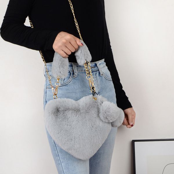 2020 net red fashion plush love female weighing hand take autumn and winter hairy heart bag 
2020 net red fashion plush love female weighing hand take autumn and winter hairy heart bag
