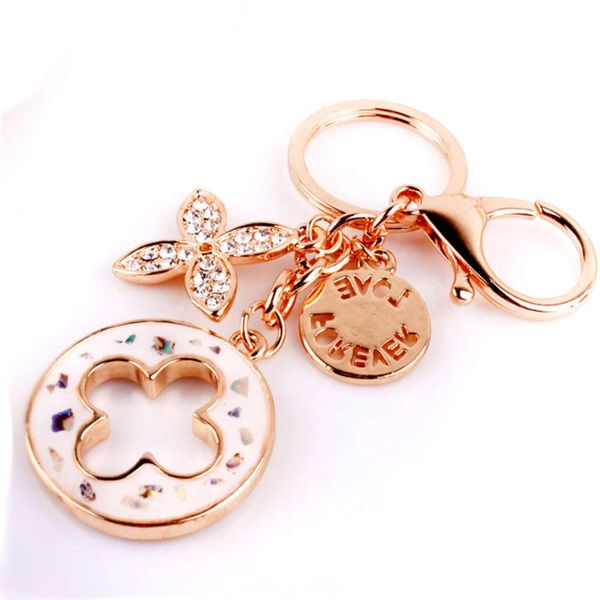 metal korean jewelry clover round brand crystal full diamond gold plated key chain, Black
metal korean jewelry clover round brand crystal full diamond gold plated key chain, Black