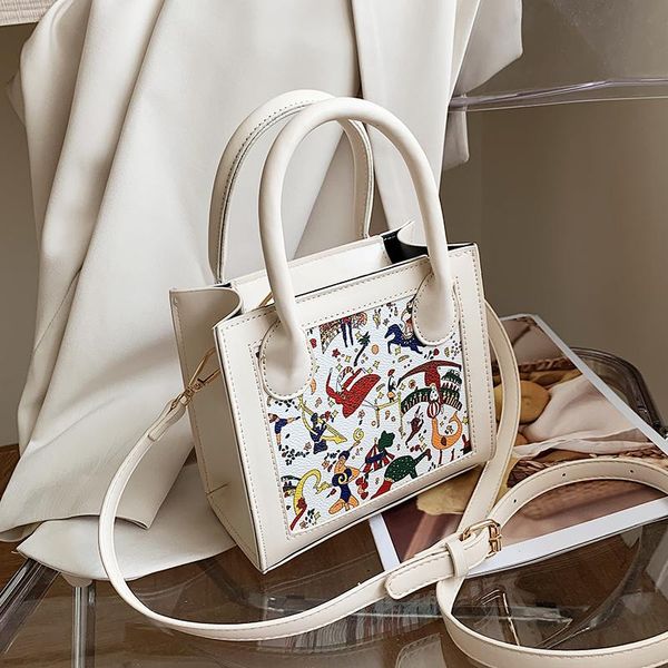 evening bags niche design premium 2021 fashion messenger bag women's handbags graffiti square shoulder width: 17cm
evening bags niche design premium 2021 fashion messenger bag women's handbags graffiti square shoulder width: 17cm