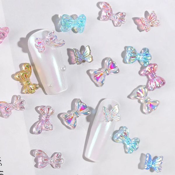 pcs holographic butterfly/bow/bear/daisy flowers designs nail art decoration 3d aurora bowknots for manicure accessories tool1, Silver;gold
pcs holographic butterfly/bow/bear/daisy flowers designs nail art decoration 3d aurora bowknots for manicure accessories tool1, Silver;gold