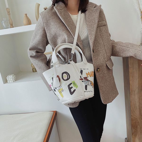 graffiti bucket bag fashion portable female handbag ins tide cute large capacity 2021 designer funny print handbags big tote trendy
graffiti bucket bag fashion portable female handbag ins tide cute large capacity 2021 designer funny print handbags big tote trendy
