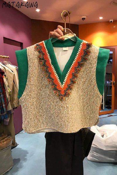 matakawa korean autumn and winter color matching v-neck sweater vest loose tweed waistcoat split sleeveless vest women 210513, Black;white
matakawa korean autumn and winter color matching v-neck sweater vest loose tweed waistcoat split sleeveless vest women 210513, Black;white