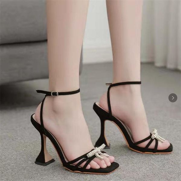 sandals summer large size high-heeled european and american black rhinestone bow one-word buckle suede fashion
sandals summer large size high-heeled european and american black rhinestone bow one-word buckle suede fashion