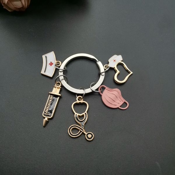 new design keychain doctor medical tool stethoscope syringe mask key ring nurse medical student gift keychain souvenir, Silver
new design keychain doctor medical tool stethoscope syringe mask key ring nurse medical student gift keychain souvenir, Silver
