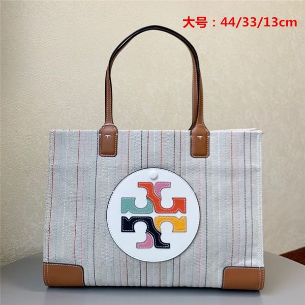 outlet spring and summer women's bag canvas with cowhide shopping bag color large insert one shoulder portable bag luxuryss designerss
outlet spring and summer women's bag canvas with cowhide shopping bag color large insert one shoulder portable bag luxuryss designerss