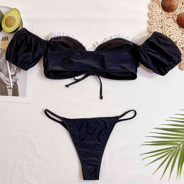 bla and white side ruffle bikini setby air
bla and white side ruffle bikini setby air