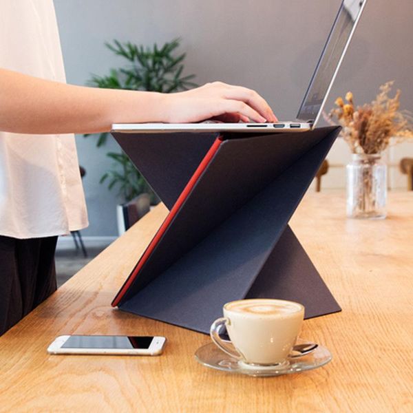 party favor foldable lapstand portable standing office computer desk multifunctional heightening macbook support frame
party favor foldable lapstand portable standing office computer desk multifunctional heightening macbook support frame