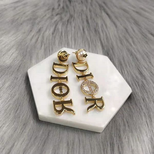 charms fashion letter long diamond inlaid brass high-grade light luxury versatile earrings and earrings, Golden
charms fashion letter long diamond inlaid brass high-grade light luxury versatile earrings and earrings, Golden