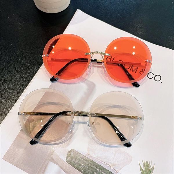 sunglasses retro round women brand designer fashion rimless ocean water cut trimmed lens sun glasses ladies frameless eyeglasses, White;black
sunglasses retro round women brand designer fashion rimless ocean water cut trimmed lens sun glasses ladies frameless eyeglasses, White;black