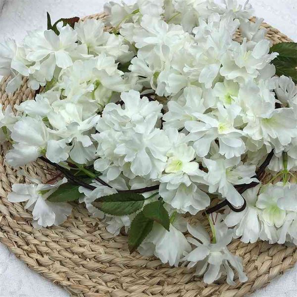 the simulation flower is suitable for the soft decoration design of cherry cane props at home
the simulation flower is suitable for the soft decoration design of cherry cane props at home