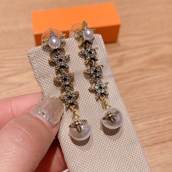 d family 925 silver needle bee pearl star two earrings and earrings, Golden
d family 925 silver needle bee pearl star two earrings and earrings, Golden