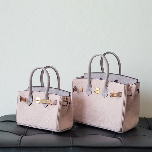 first layer cow leather bag mini small new women's single shoulder portable messenger color matching purse sale
first layer cow leather bag mini small new women's single shoulder portable messenger color matching purse sale