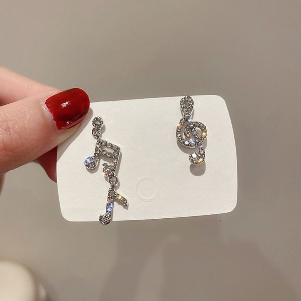 925 silver needle asymmetric inlaid diamond notes earrings designer dongdamen small earrings fashion personality net red earrings, Golden;silver
925 silver needle asymmetric inlaid diamond notes earrings designer dongdamen small earrings fashion personality net red earrings, Golden;silver