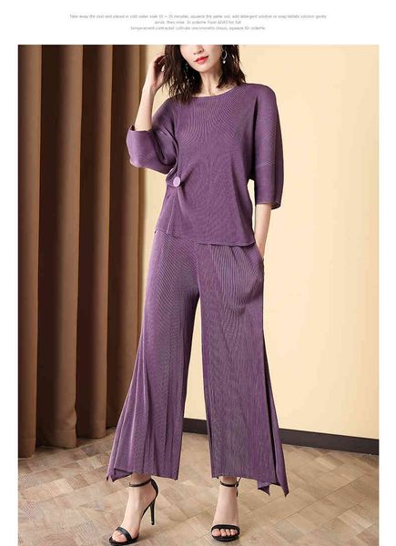 dresses miyake fold fashion suits o-neck three quarter sleeve button t-shirt wide-legged pants two-piece suit, White
dresses miyake fold fashion suits o-neck three quarter sleeve button t-shirt wide-legged pants two-piece suit, White