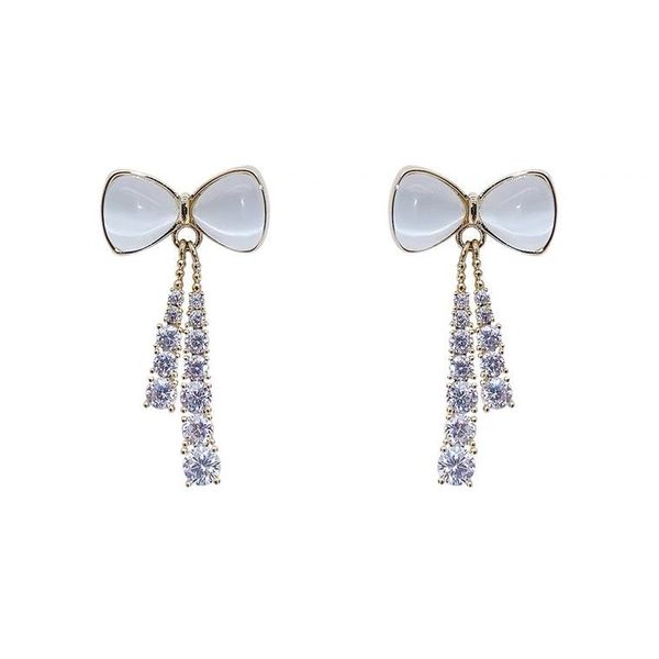 summer fairy japanese and korean wild bow tassel earrings opal long modified face luxury earrings female silver needle., Golden;silver
summer fairy japanese and korean wild bow tassel earrings opal long modified face luxury earrings female silver needle., Golden;silver
