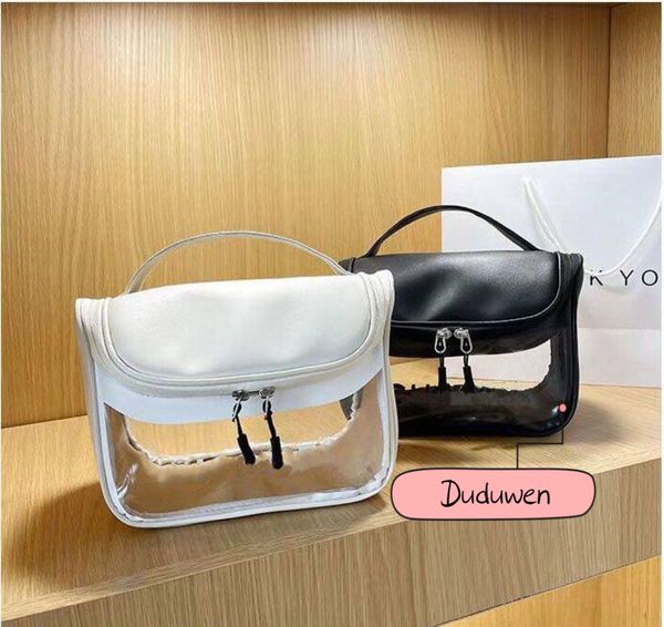 23x18x13cm fashion makeup bag c letters classic pvc transparency comsetics storage bags 2c gift for travel263s
23x18x13cm fashion makeup bag c letters classic pvc transparency comsetics storage bags 2c gift for travel263s