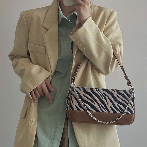 vintage pu leather women chain shoulder crossbody bags fashion ladi underarm bag zebra pattern female plush purse handbags
vintage pu leather women chain shoulder crossbody bags fashion ladi underarm bag zebra pattern female plush purse handbags