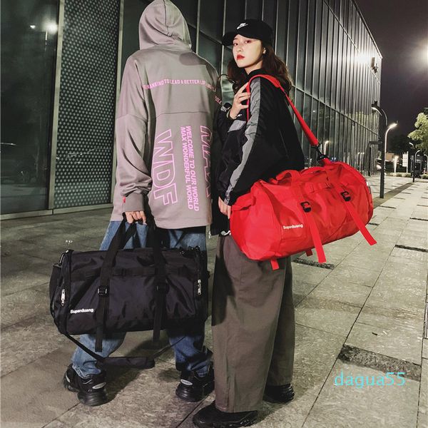 messenger men's fashion brand large capacity handbag women's sports and fitness short distance travel bag business luggage 
messenger men's fashion brand large capacity handbag women's sports and fitness short distance travel bag business luggage