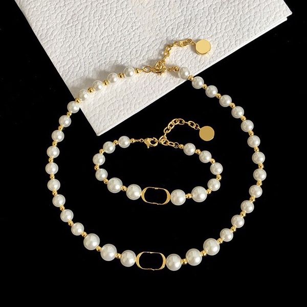 luxury designer jewelry women necklace pearl chokers necklaces with gold letter pendant and bracelets suits brass material fashion style, Silver
luxury designer jewelry women necklace pearl chokers necklaces with gold letter pendant and bracelets suits brass material fashion style, Silver