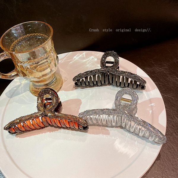 simple design acrylic inlaid diamond shark clip east gate temperament net red fashion hairpin female, Golden;silver
simple design acrylic inlaid diamond shark clip east gate temperament net red fashion hairpin female, Golden;silver