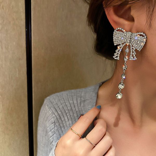 925 silver needle court style design full diamond bow tassel earrings net red simple earrings long earrings
925 silver needle court style design full diamond bow tassel earrings net red simple earrings long earrings