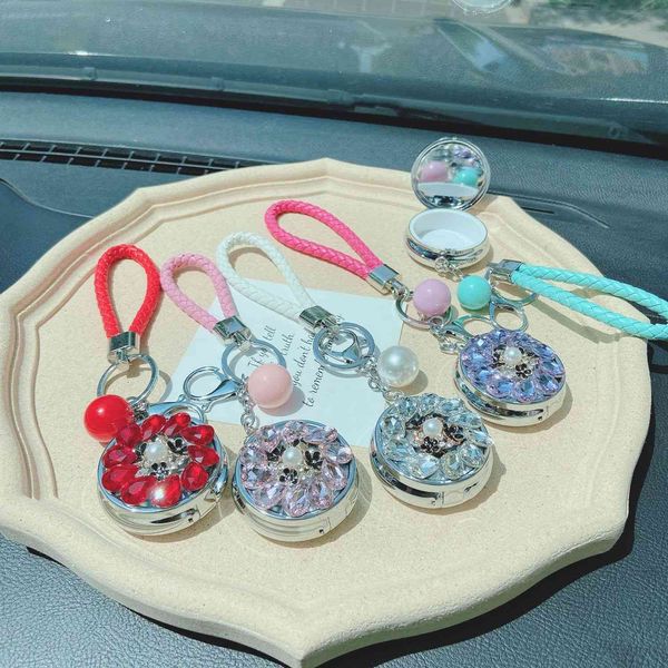 creative crystal inlaid diamond small round mirror key chain folding storage box portable car bag pendant, Silver
creative crystal inlaid diamond small round mirror key chain folding storage box portable car bag pendant, Silver