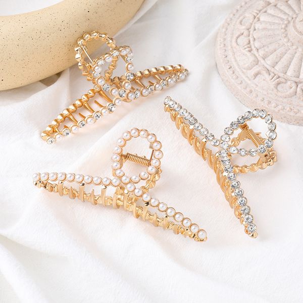 elegant women crystal pearls of geometric luxury big metal claws sweet clip hairpin accessories for hair, Golden;silver
elegant women crystal pearls of geometric luxury big metal claws sweet clip hairpin accessories for hair, Golden;silver