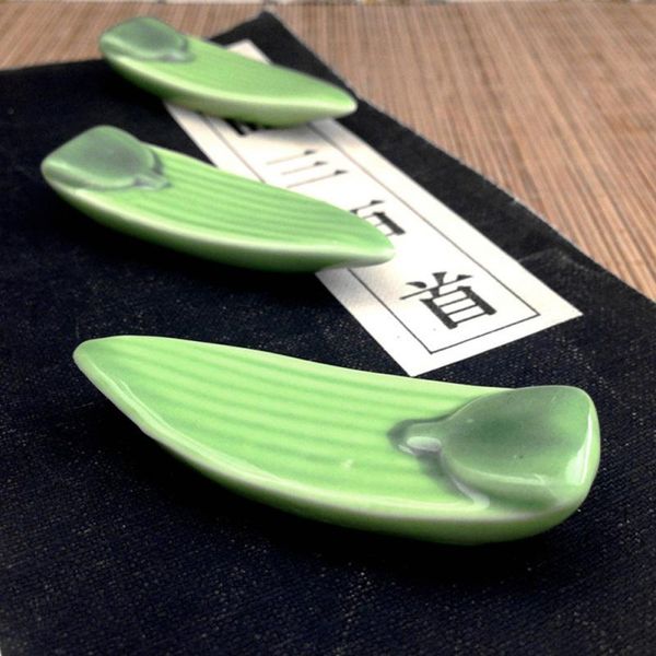 chopsticks 1pc bamboo leaf shape ceramic chopstick holder tableware accessories pen rack diy home table ornaments
chopsticks 1pc bamboo leaf shape ceramic chopstick holder tableware accessories pen rack diy home table ornaments