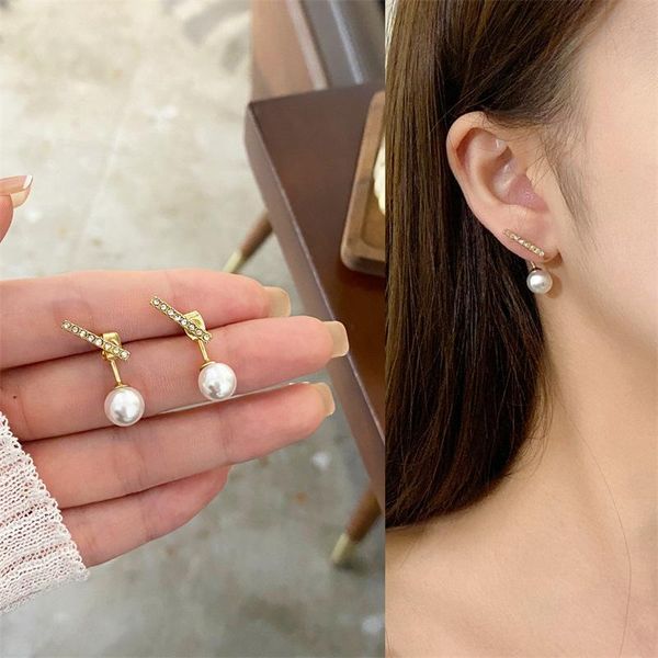 stud needle korean east gate simple rhinestone small one word pearl earrings versatile temperament girl, Golden;silver
stud needle korean east gate simple rhinestone small one word pearl earrings versatile temperament girl, Golden;silver