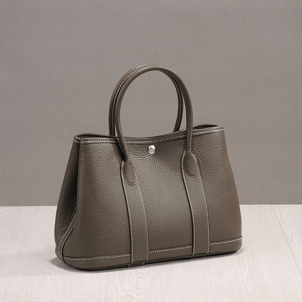design hand korean version simple 2021 european lychee grain head portable casual leather one shoulder women's garden bag lolh
design hand korean version simple 2021 european lychee grain head portable casual leather one shoulder women's garden bag lolh