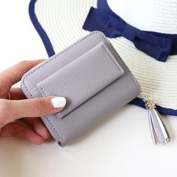 2021 new female short zipper buckle wallet tassel rfid mini student cute little coin wallet, Red;black
2021 new female short zipper buckle wallet tassel rfid mini student cute little coin wallet, Red;black