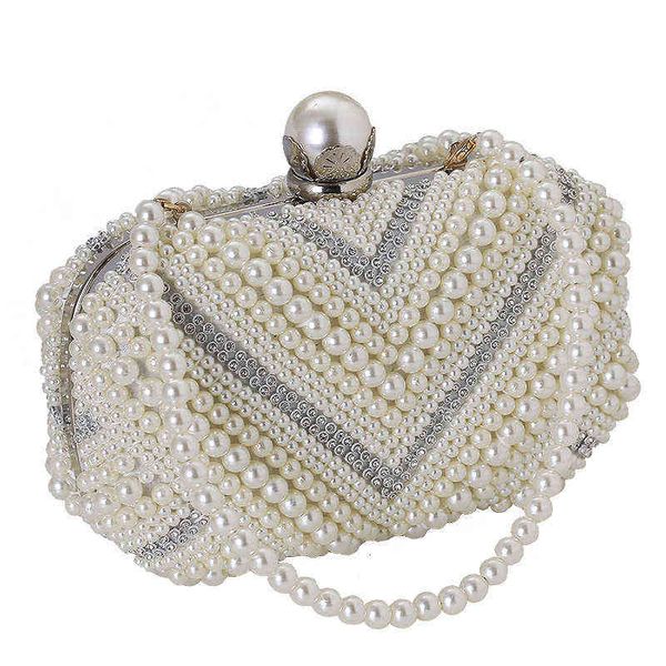 warm bella round dinner bag evening ess bag banquet pearl women's hand japanese and korean
warm bella round dinner bag evening ess bag banquet pearl women's hand japanese and korean